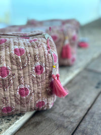 detail of pink quilted travel bags - The Fox and the Mermaid